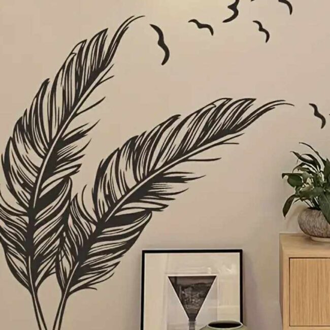 ملصق جداري أنيق بتصميم ريش الطيور والطيران